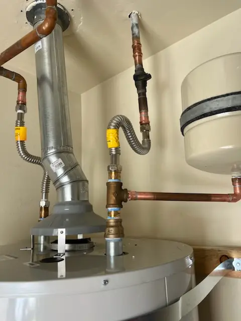 Water heater installation and plumbing repair in Dewy Rose